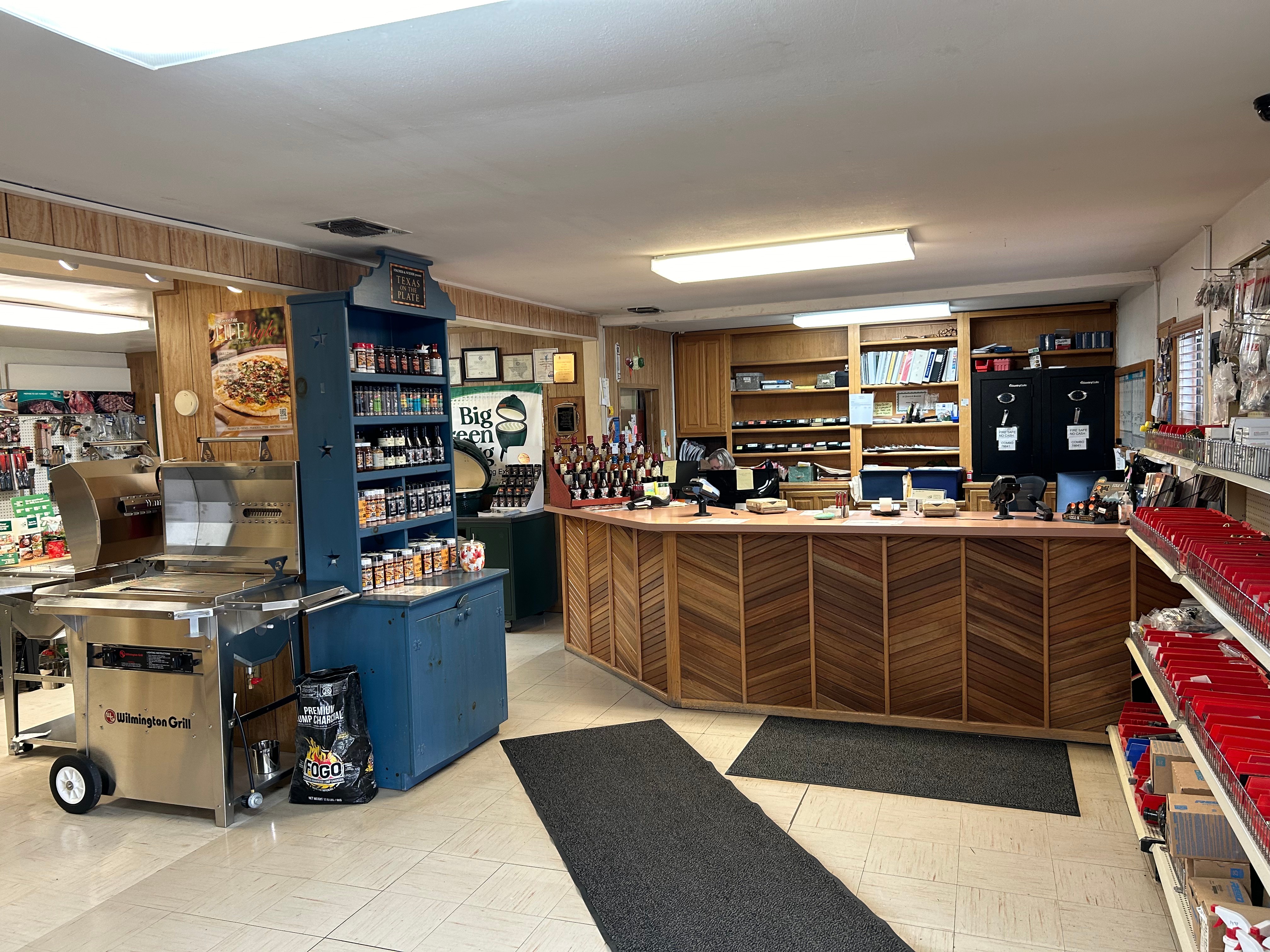 Action Propane storefront interior showing Wilmington Grill on display floor