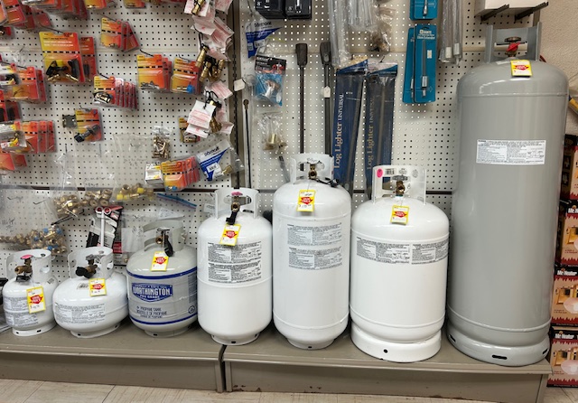 DOT propane cylinders for sale at Action Propane in Leander TX — multiple sizes from 5 lb to 100 lb